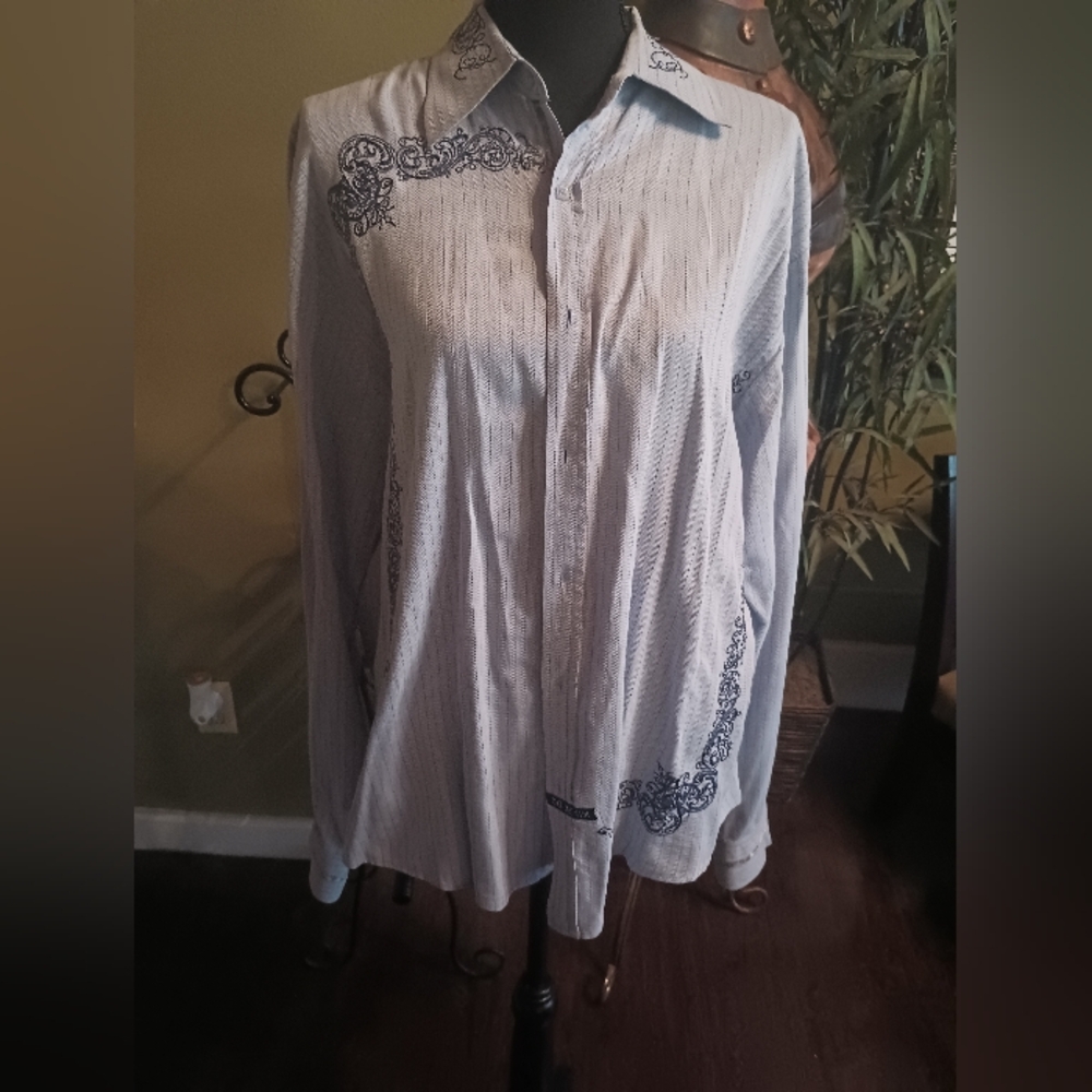 Men's light blue embroidered button-down dress shirt.